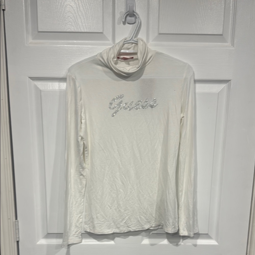 Guess Long Sleeve Turtle Neck
NWT
Size L